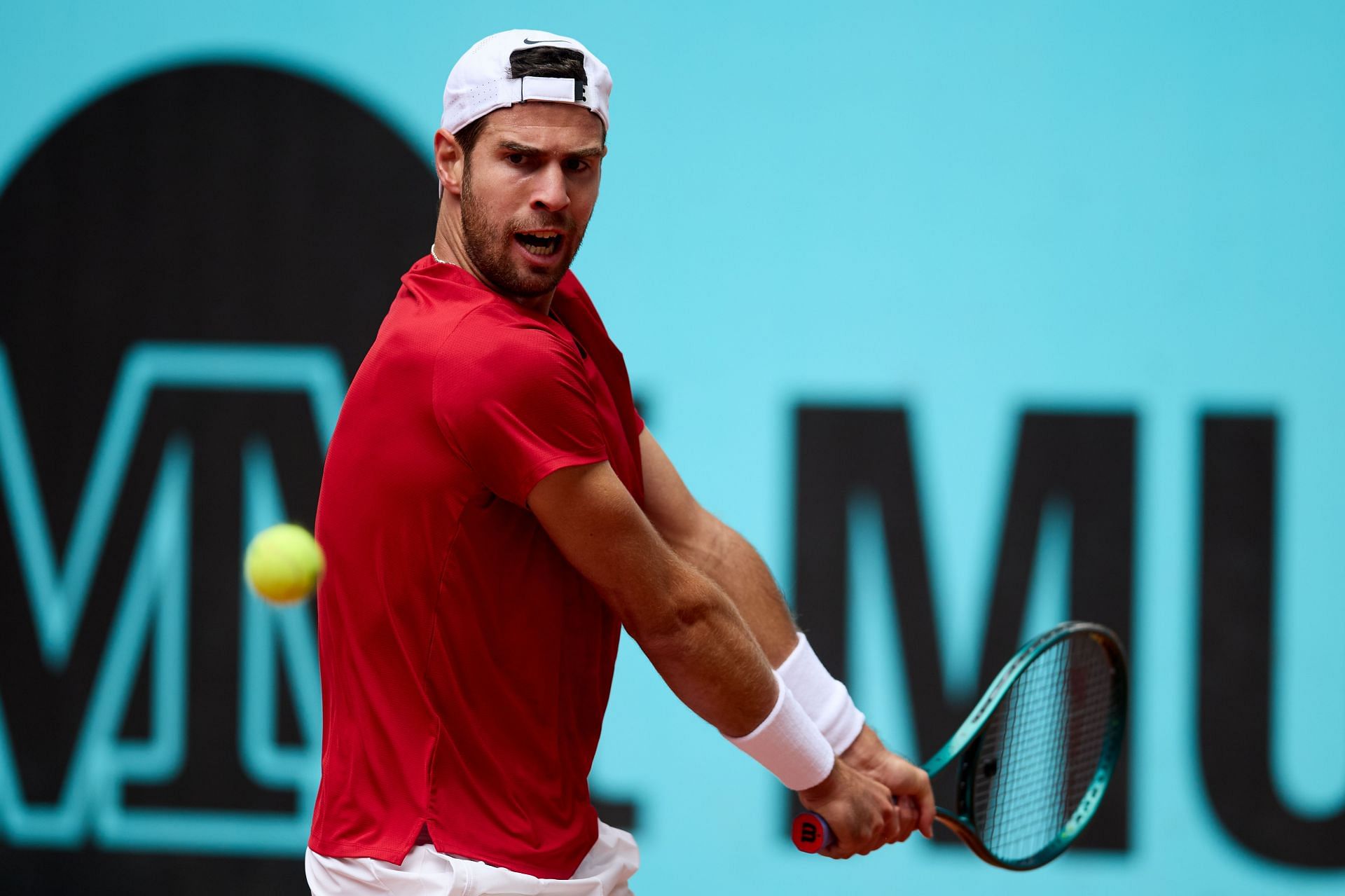 Khachanov plays a backhand in the Mutua Madrid Open - Day Eight - Source: Getty
